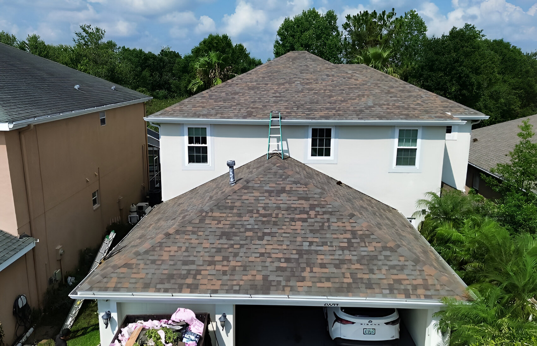 Front-facing view of a single residential house showing architectural design and visible front roof structure, built by JAC Builders